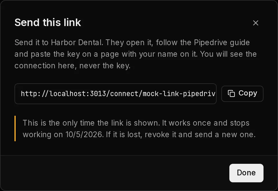 The Send this link dialog: the link to send the client with a Copy button, shown this one time.
